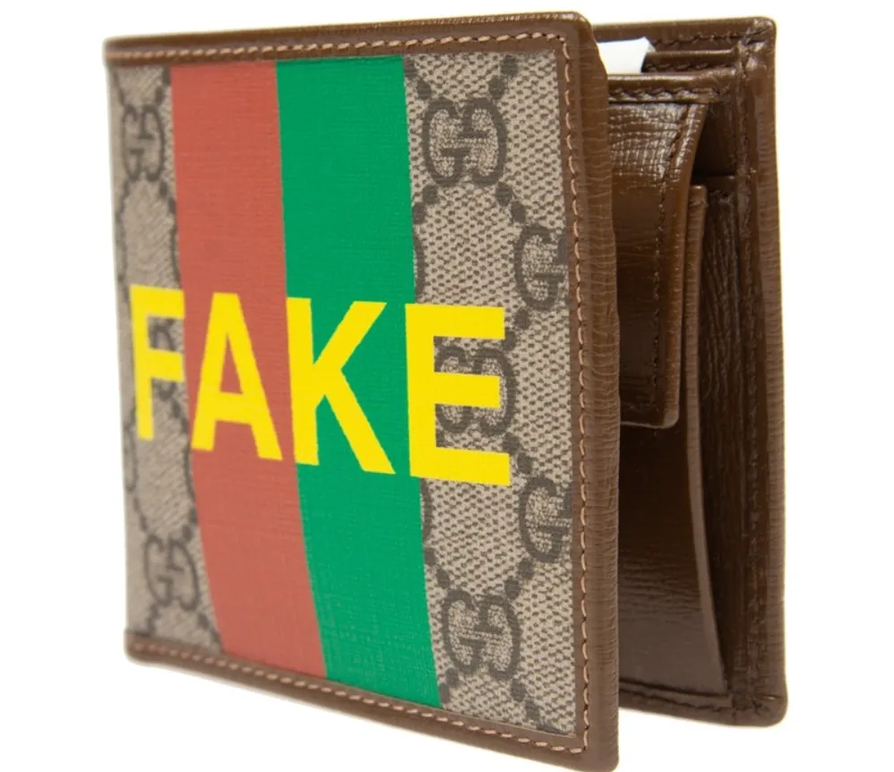 Gucci Interlocking GG Supreme BiFold Wallet